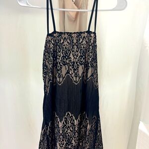 Lace, black and tan dress. Parisian brand size 8. fits more like a size 4-6.